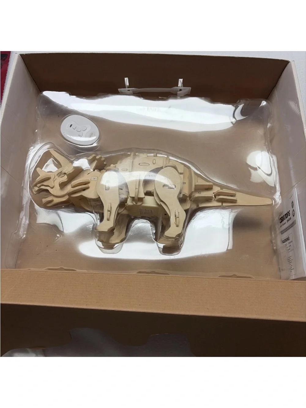 Pottery Barn Kids Remote Control Triceratops - moves and roars - wooden
